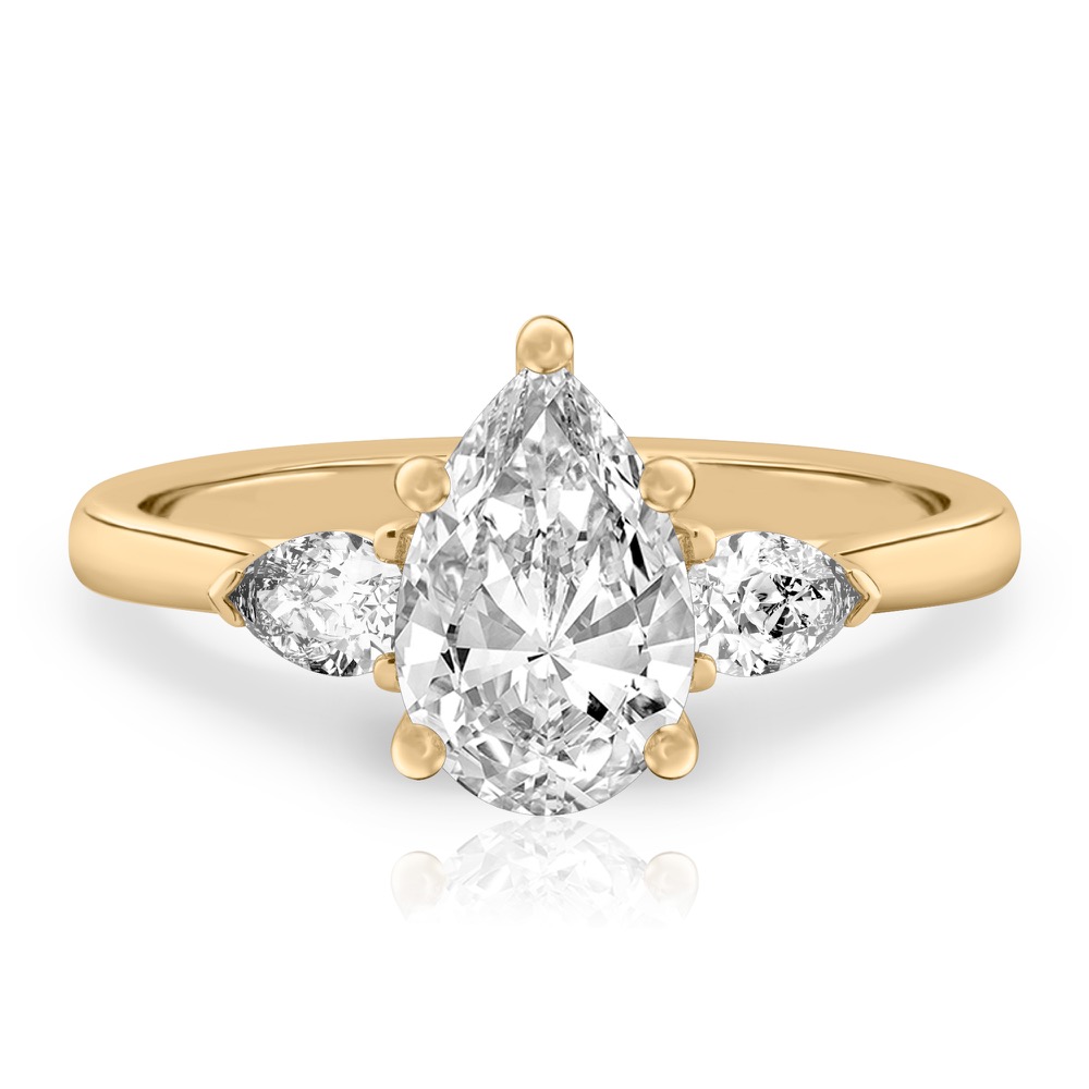 pear shape diamond pear side stone engagement ring yellow gold