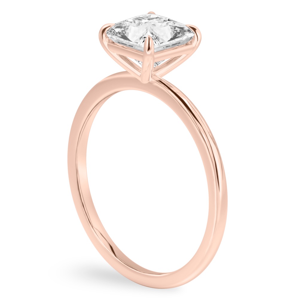 Angle view of princess cut diamond delicate solitaire engagement ring rose gold