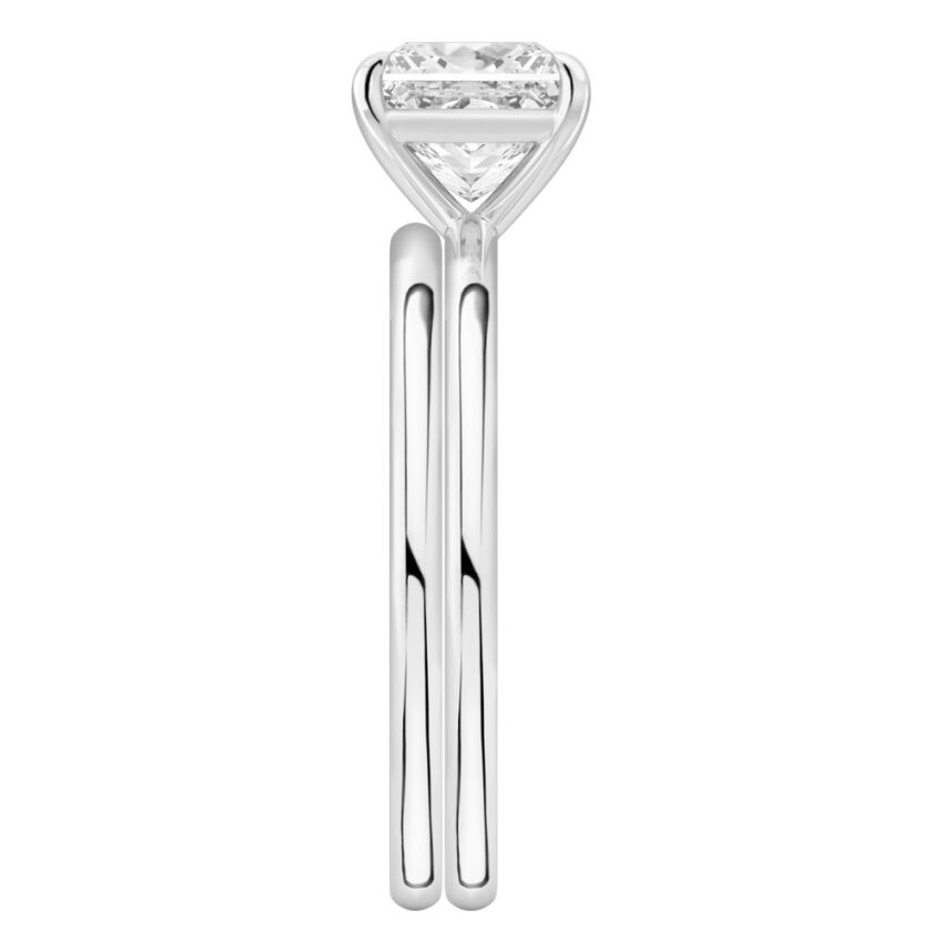Side view of princess cut diamond delicate solitaire engagement ring set palladium
