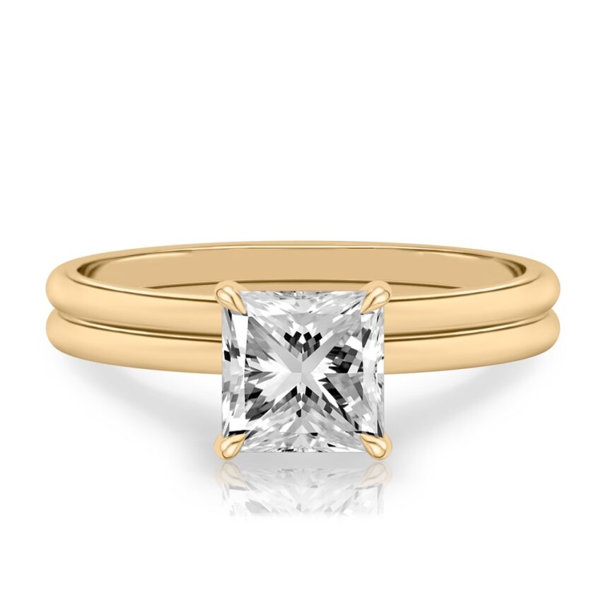princess cut diamond delicate solitaire engagement ring in set yellow gold