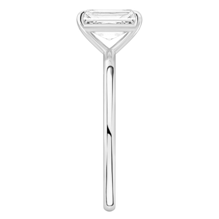 Side view of radiant cut diamond delicate solitaire engagement ring palladium
