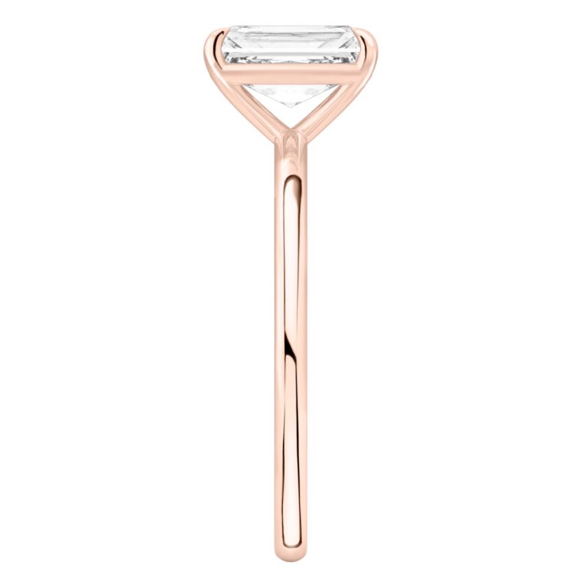 Side view of radiant cut diamond delicate solitaire engagement ring rose gold