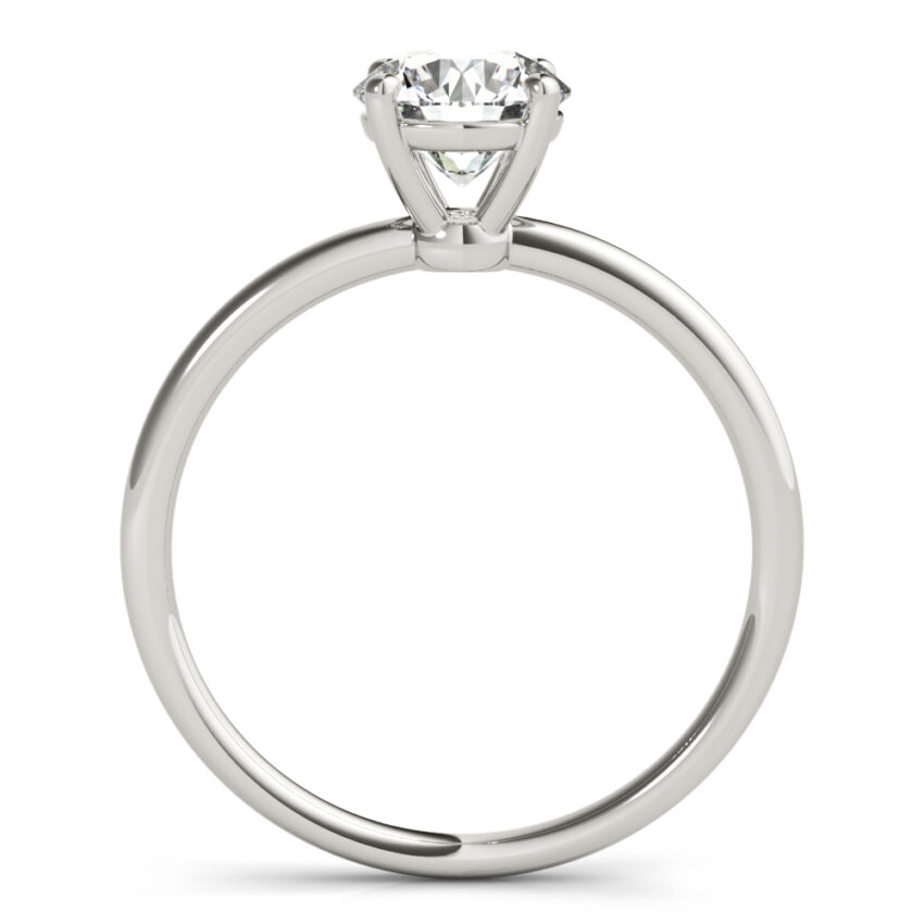side view of round cut diamond dainty solitaire engagement ring in palladium