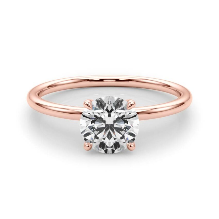 round cut diamond dainty solitaire engagement ring in rose gold