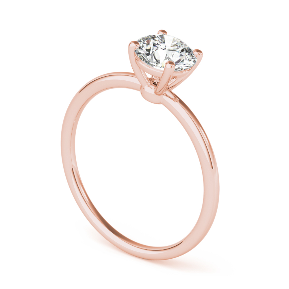 angle view of round cut diamond dainty solitaire engagement ring in rose gold