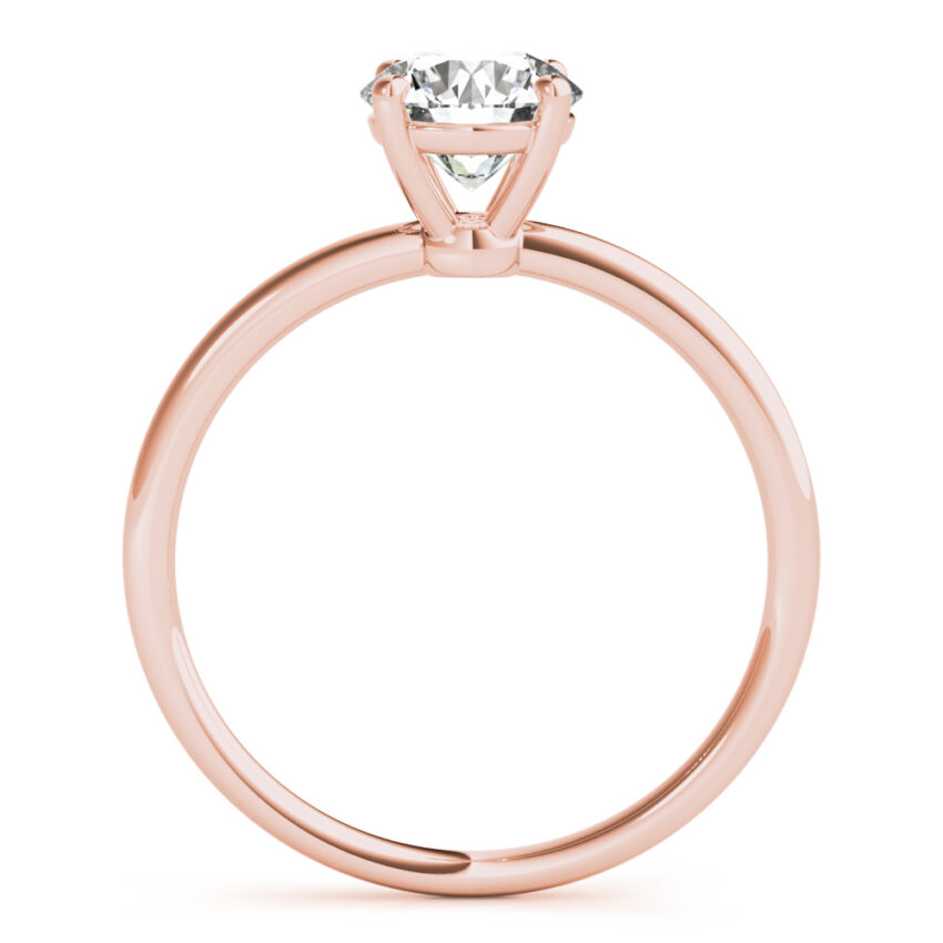 side view of round cut diamond dainty solitaire engagement ring in rose gold