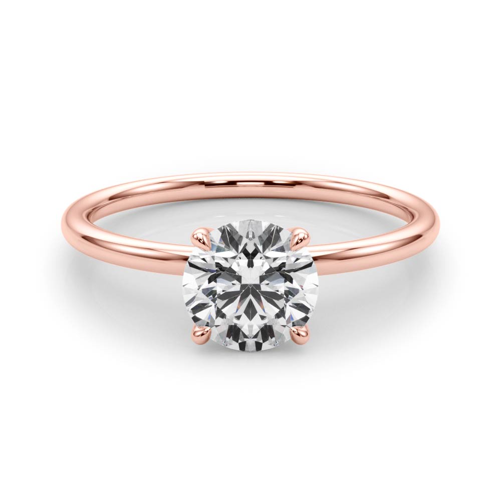 round cut diamond dainty solitaire engagement ring in rose gold