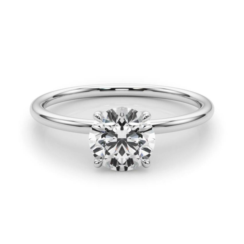 round cut diamond dainty solitaire engagement ring in white gold