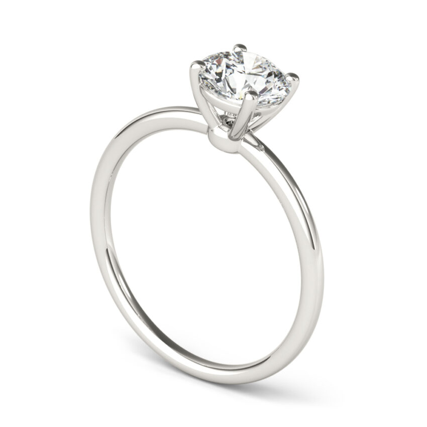 angle view of round cut diamond dainty solitaire engagement ring in white gold