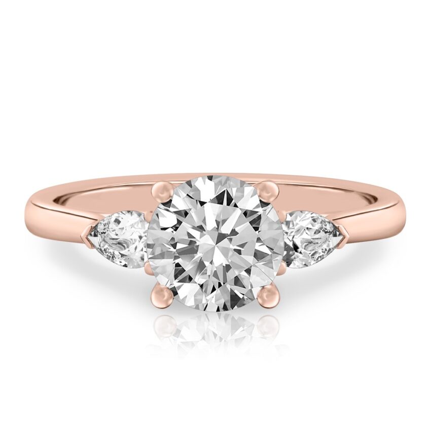 round cut diamond pear side stone engagement ring rose gold
