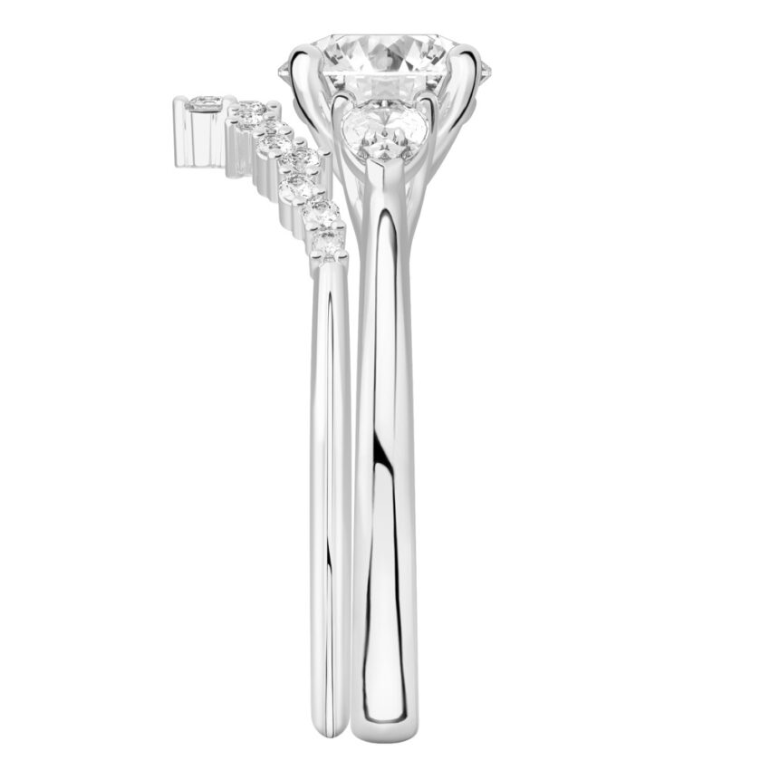 round cut diamond pear side stone engagement ring set platinum side