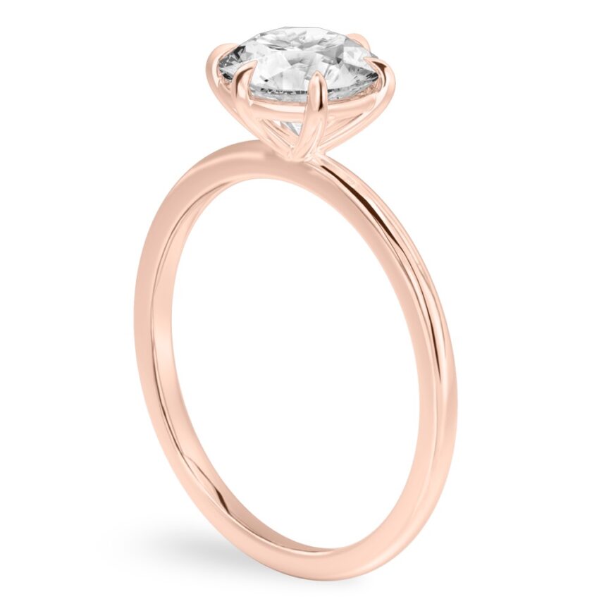 round cut diamond six prong delicate solitaire engagement ring rose gold angle
