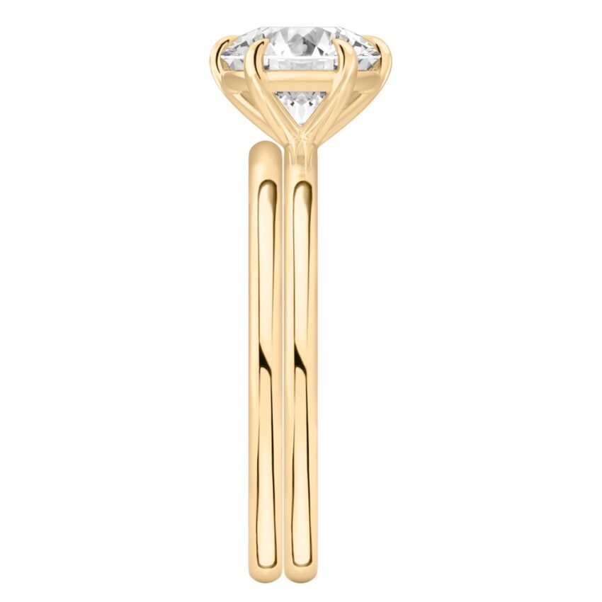 round cut diamond six prong delicate solitaire engagement ring set yellow gold side