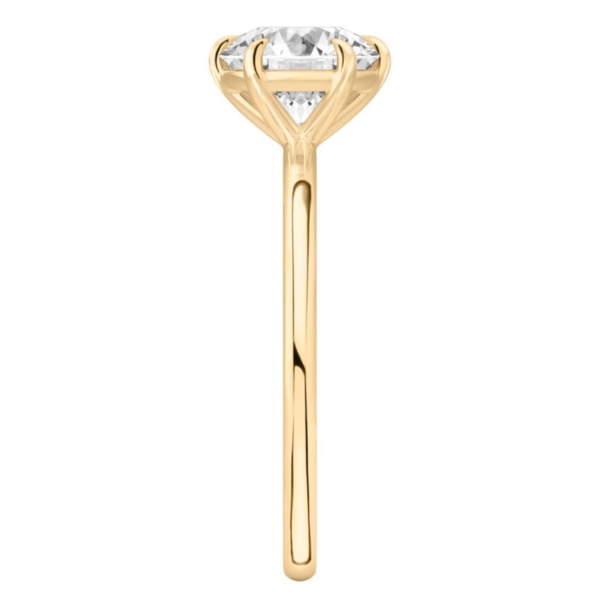 round cut diamond six prong delicate solitaire engagement ring yellow gold side