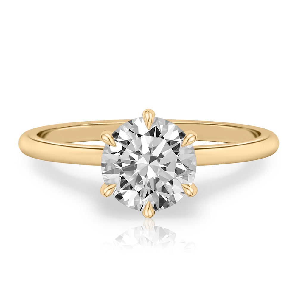 round cut diamond six prong delicate solitaire engagement ring yellow gold