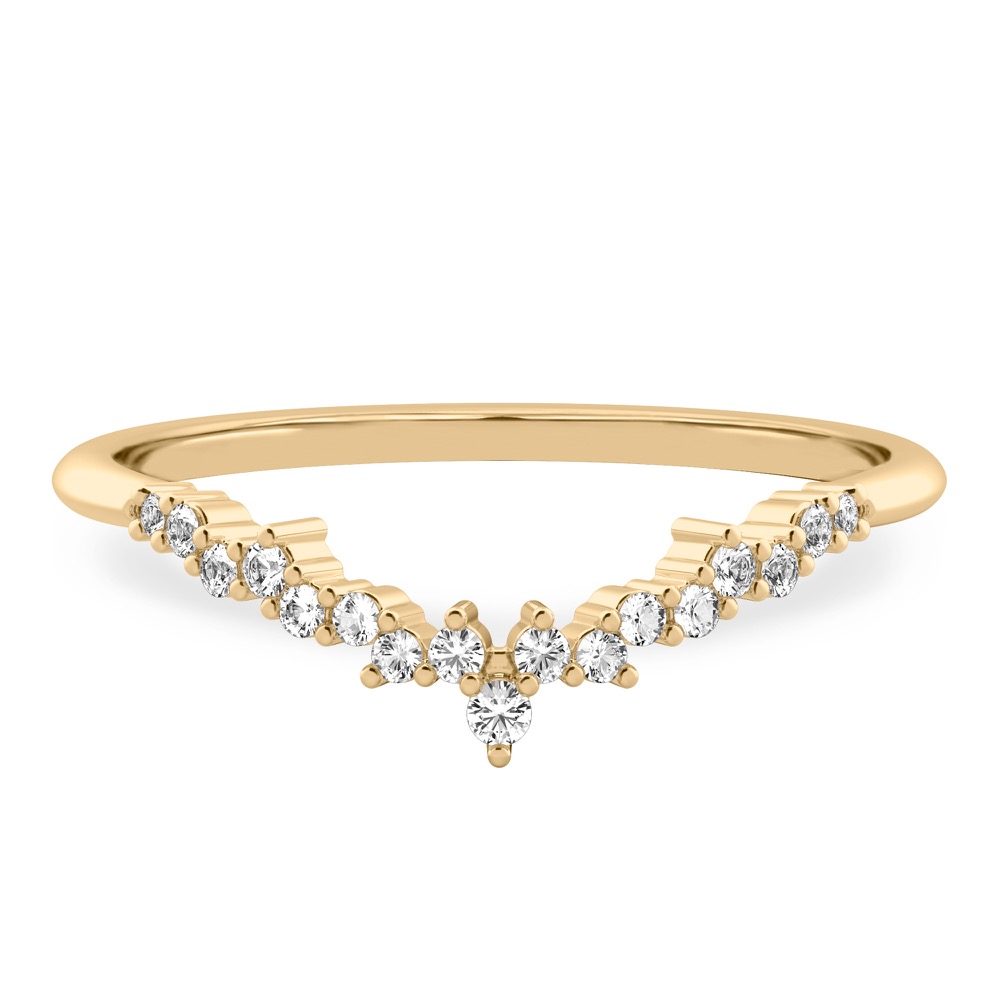scattered diamonds across curved chevron wedding band in yellow gold
