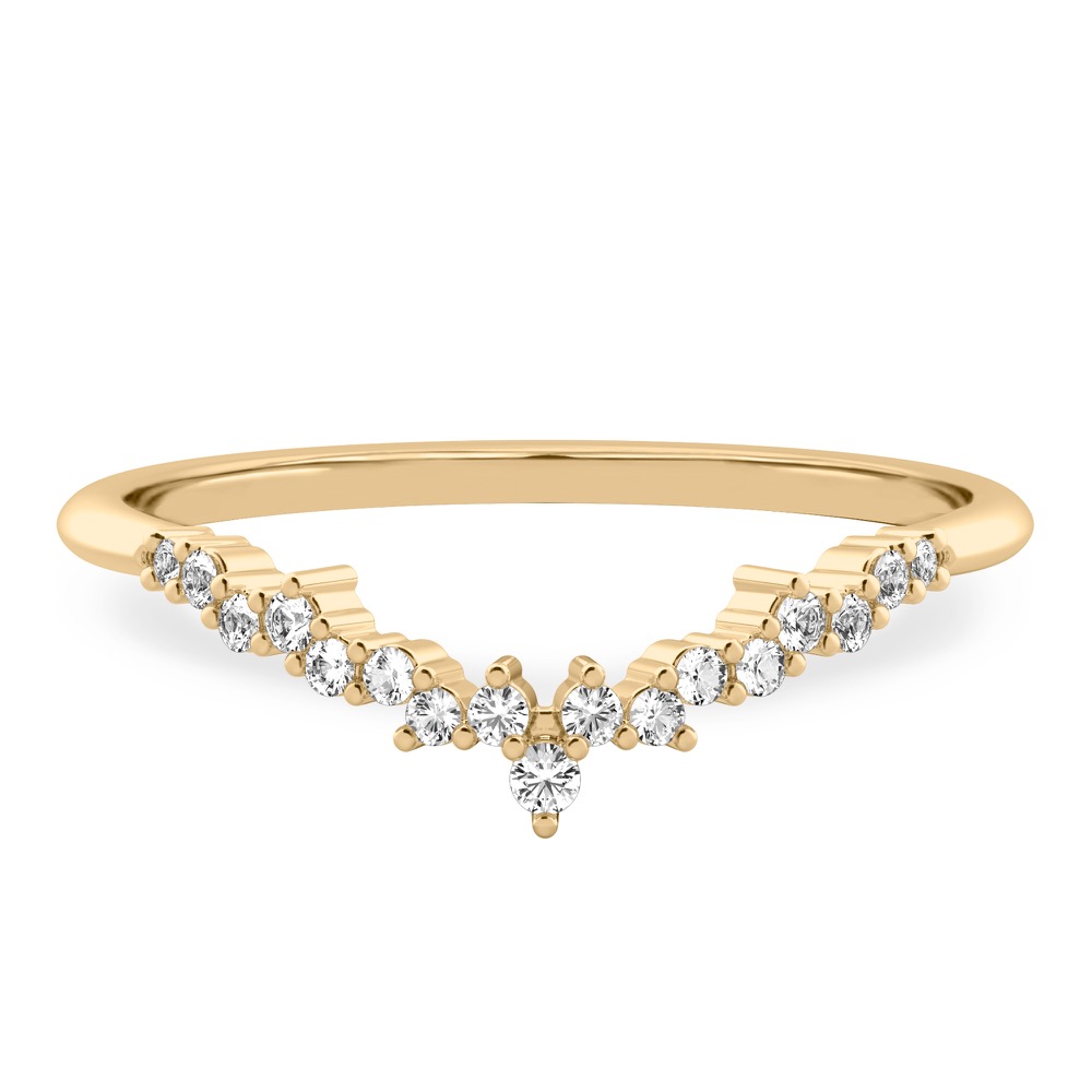 scattered diamonds across curved chevron wedding band in yellow gold