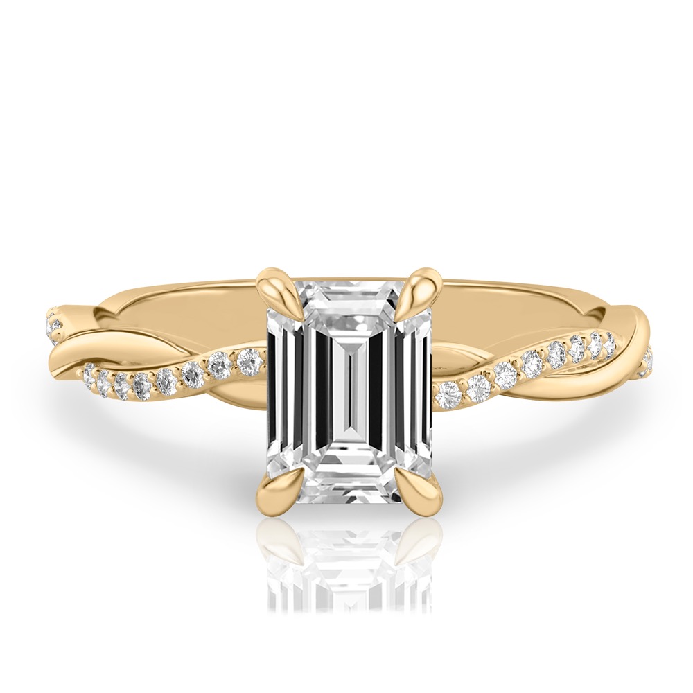 emerald cut diamond twist engagement ring yellow gold