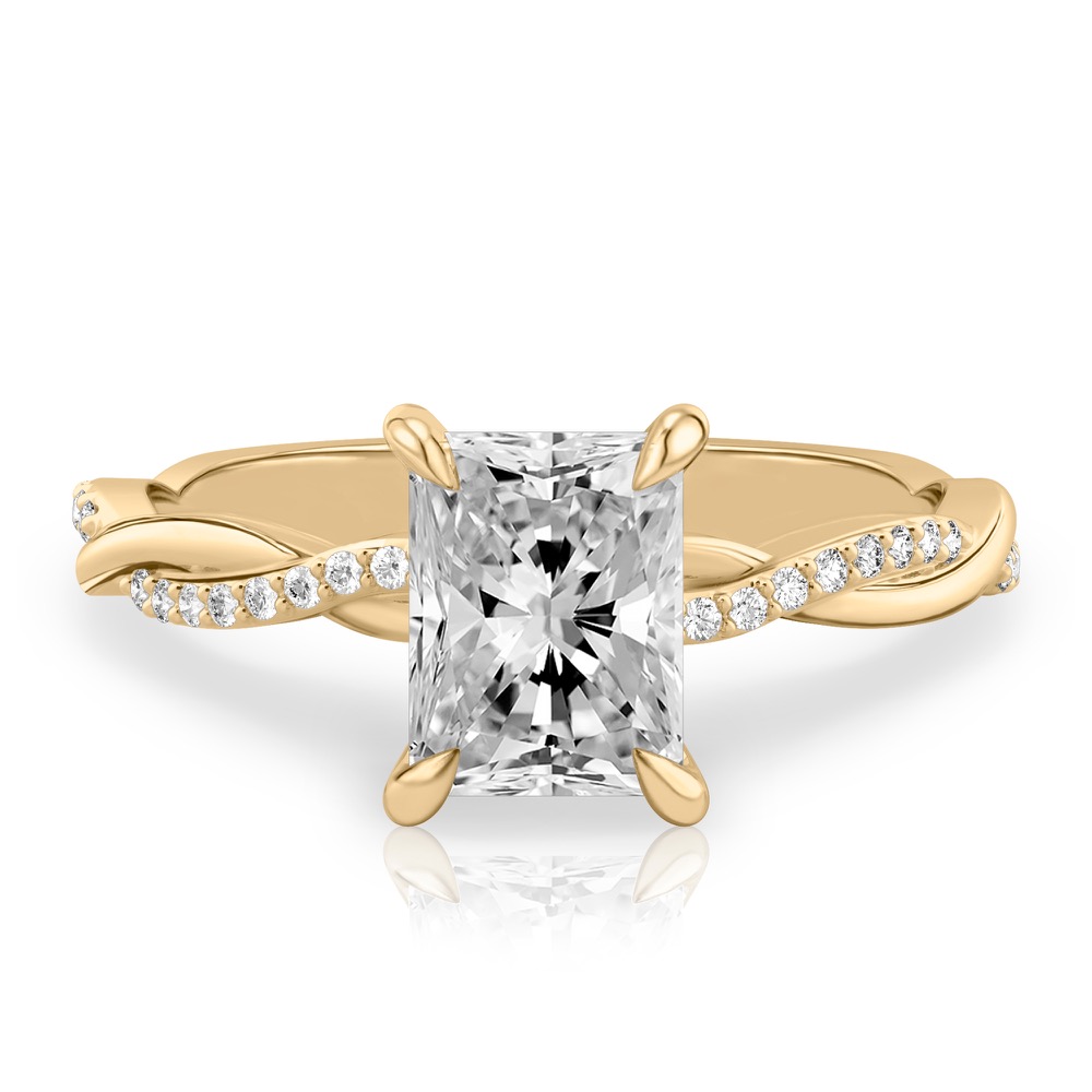 radiant cut diamond intertwined engagement ring yellow gold
