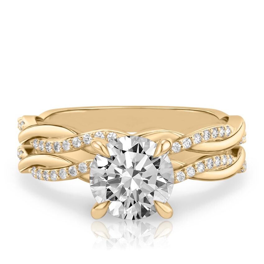 round cut diamond twist engagement ring set yellow gold