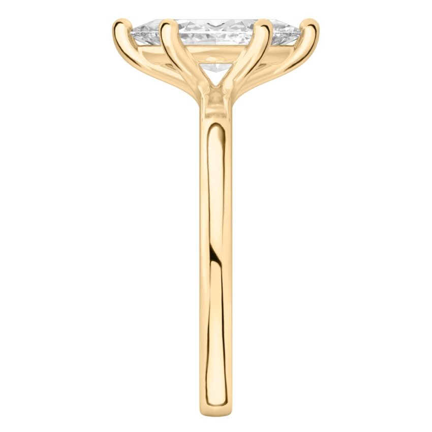 marquise cut diamond basket setting engagement ring yellow gold side