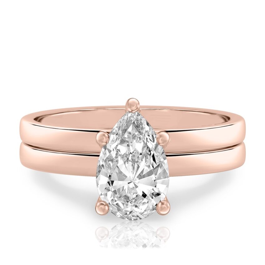 pear shape diamond basket setting engagement ring set rose gold