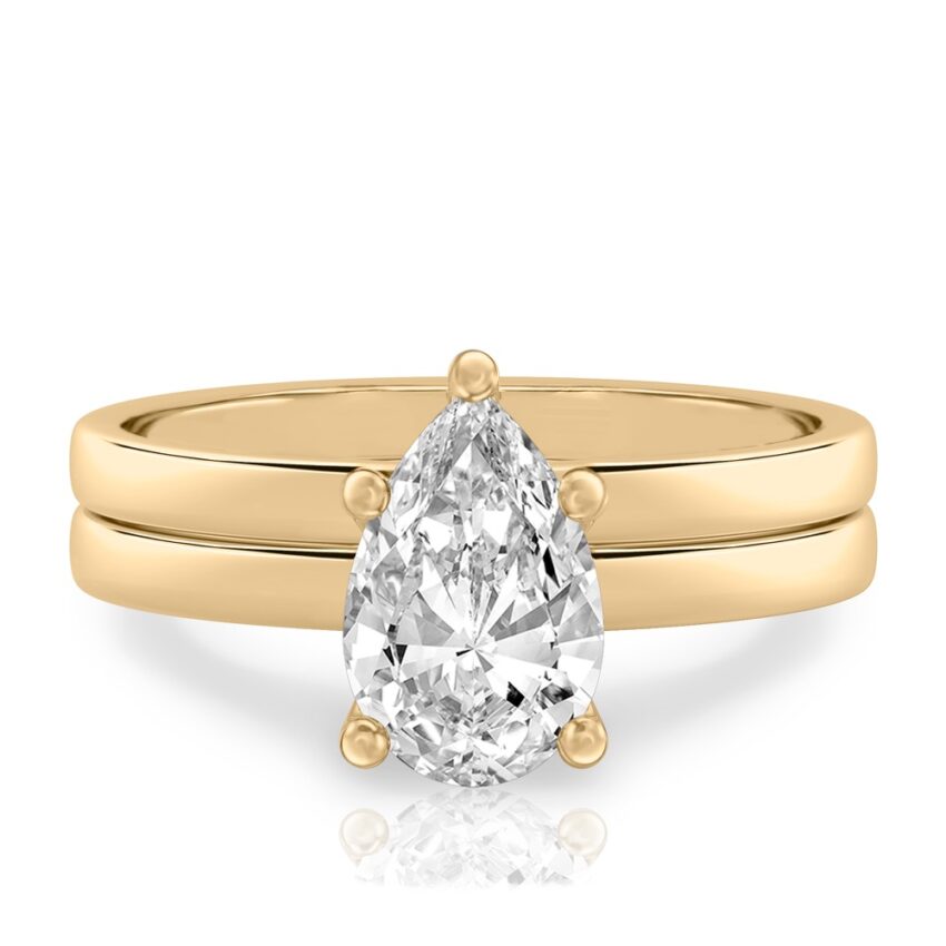 pear shape diamond basket setting engagement ring set yellow gold