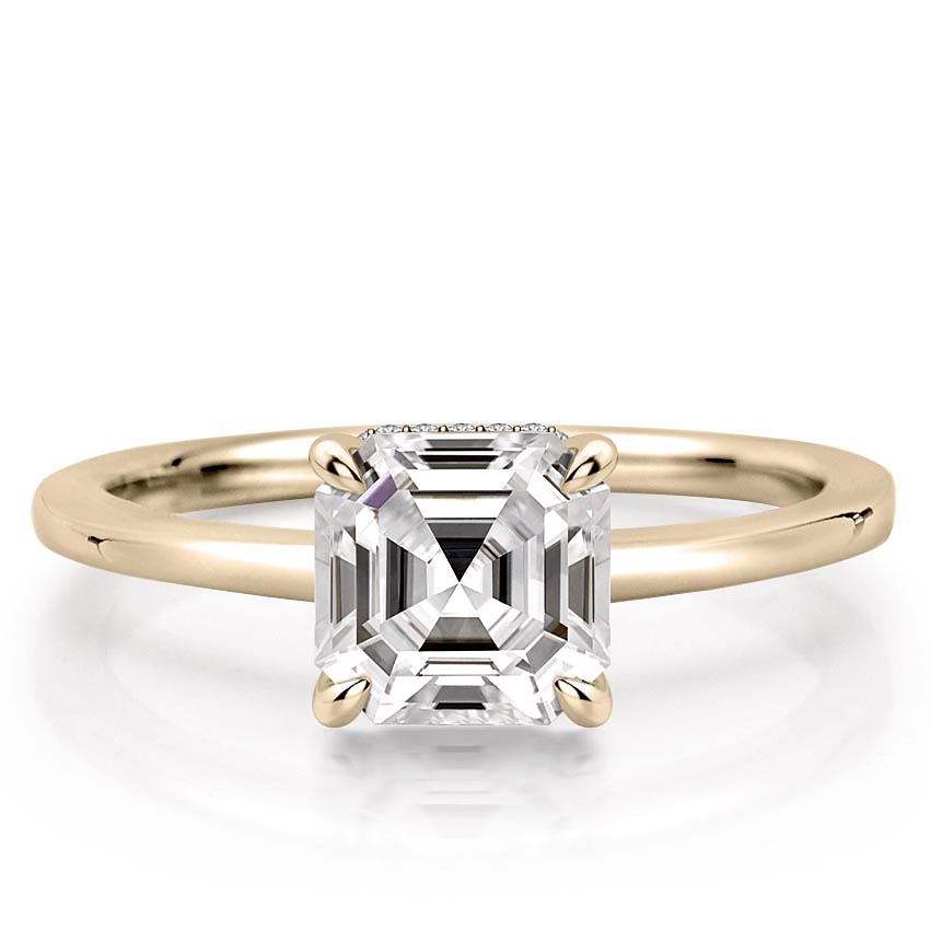 asscher cut diamond secret halo engagement ring in yellow gold