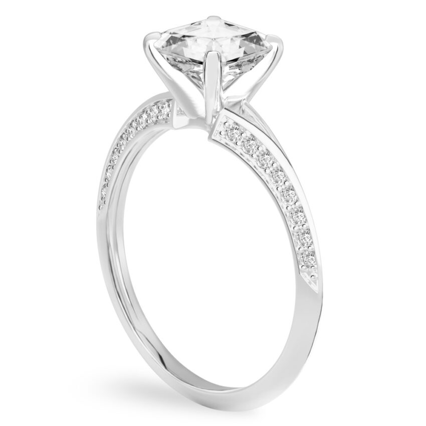 Angle view of asscher cut diamond split shank knife edge engagement ring in white gold