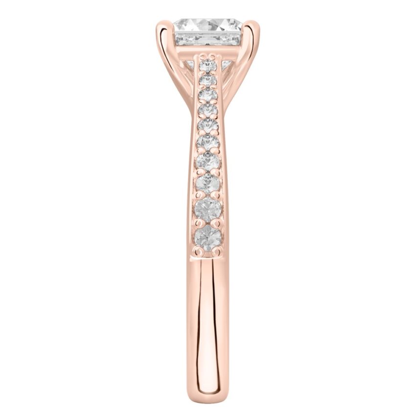 Side view of asscher cut diamond tapered engagement ring in rose gold