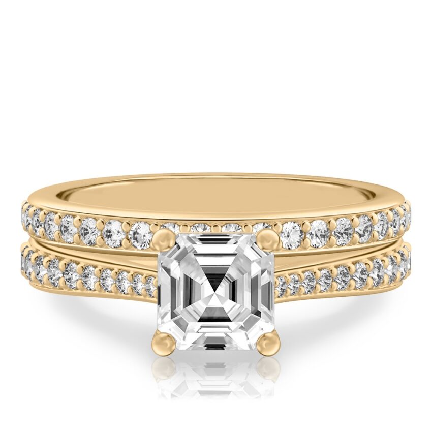 asscher cut diamond tapered engagement ring set yellow gold