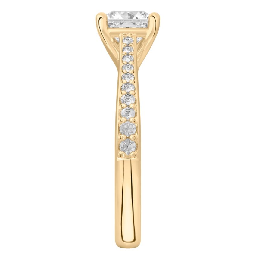Side view of asscher cut diamond tapered engagement ring in yellow gold