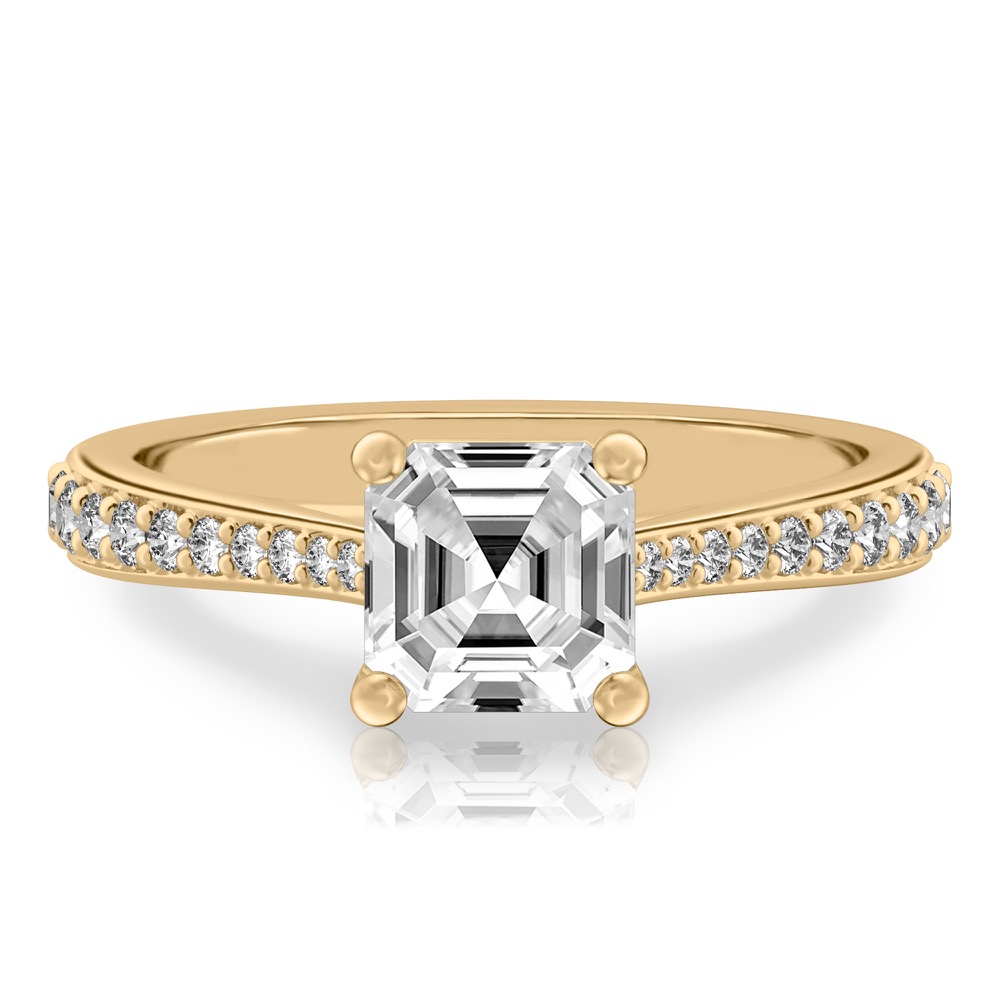 asscher cut diamond tapered engagement ring in yellow gold