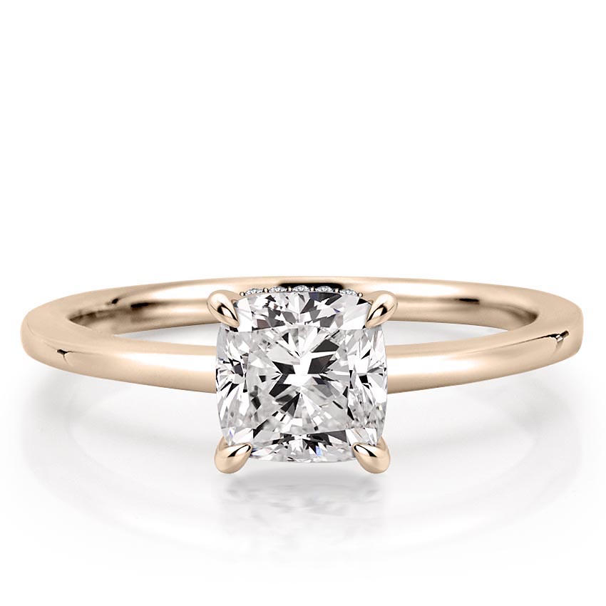 cushion cut diamond secret halo engagement ring in rose gold