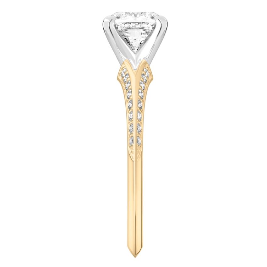 Side view of cushion cut diamond split shank knife edge engagement ring in yellow gold