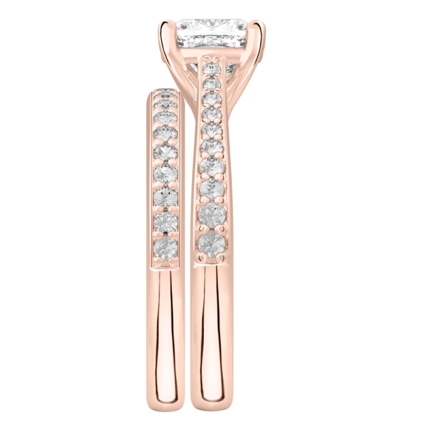 Side view of cushion cut diamond tapered engagement ring set rose gold