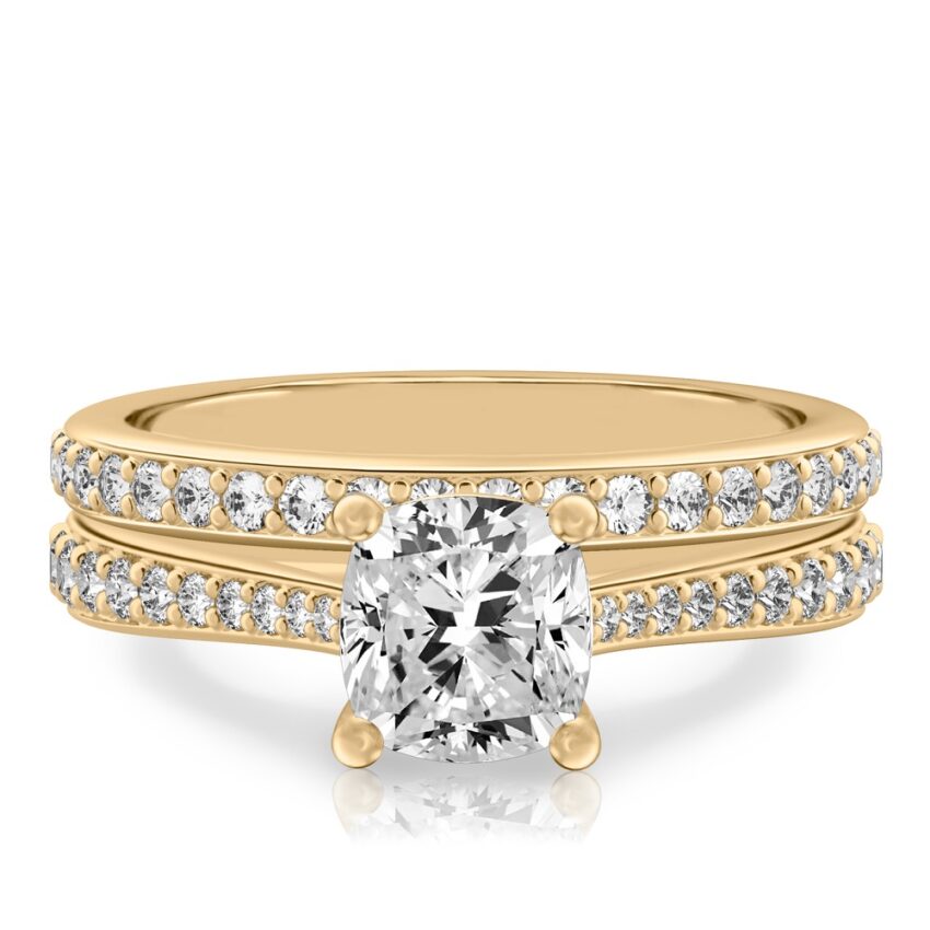cushion cut diamond tapered engagement ring set yellow gold