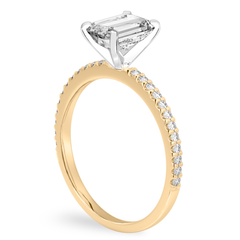 emerald cut diamond dainty engagement ring yellow gold angle