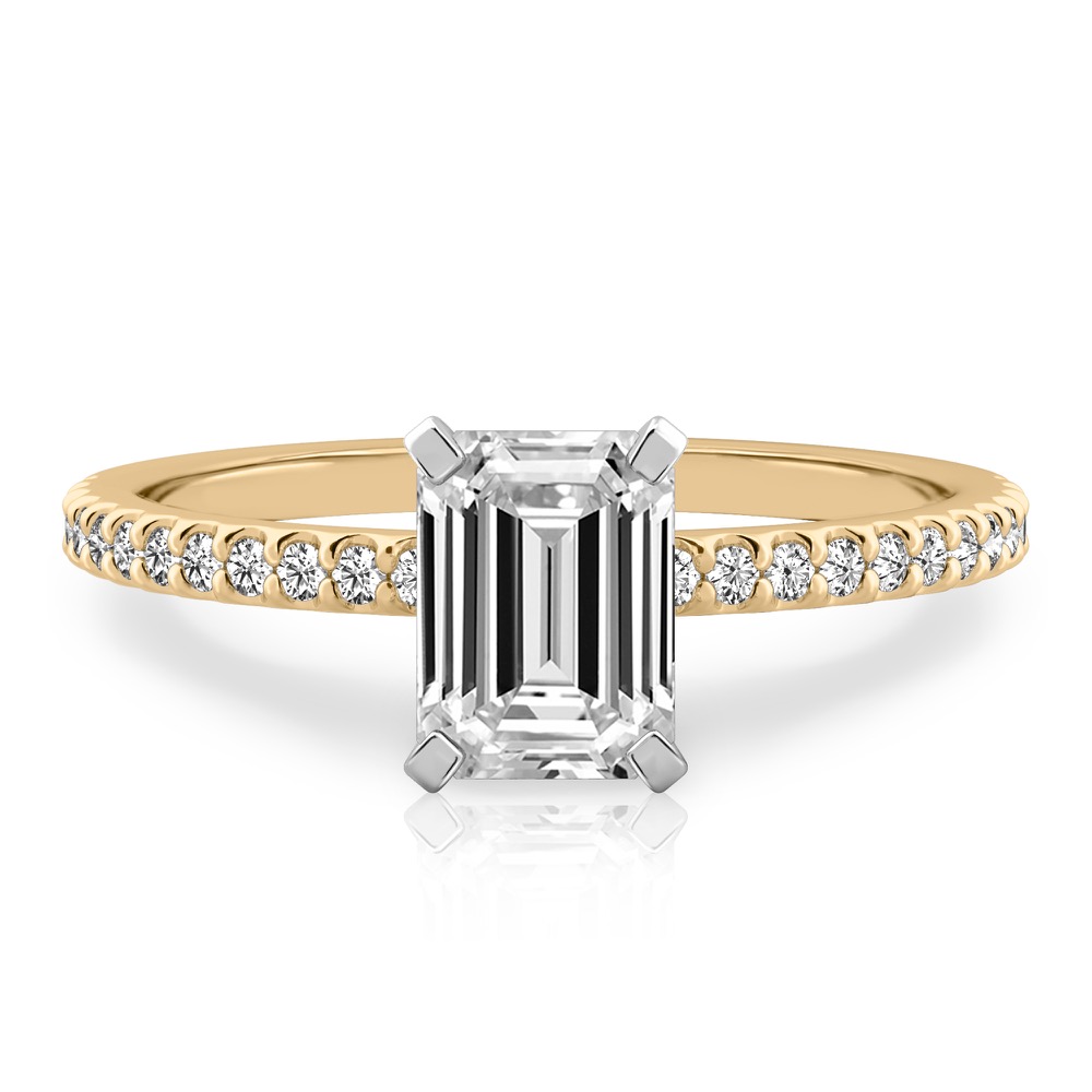 emerald cut diamond dainty engagement ring yellow gold