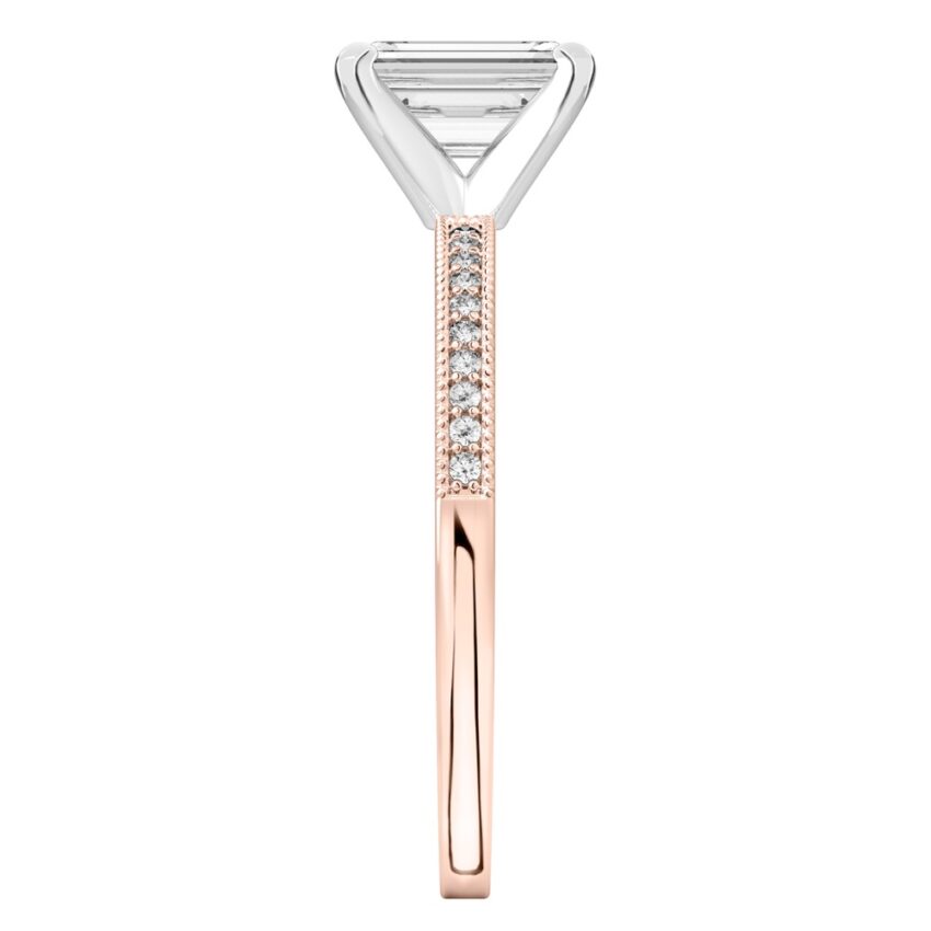 Side view of emerald cut diamond petite milgrain diamond engagement ring in rose gold