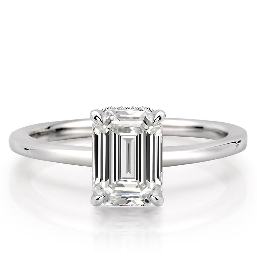 emerald cut diamond secret halo engagement ring in platinum