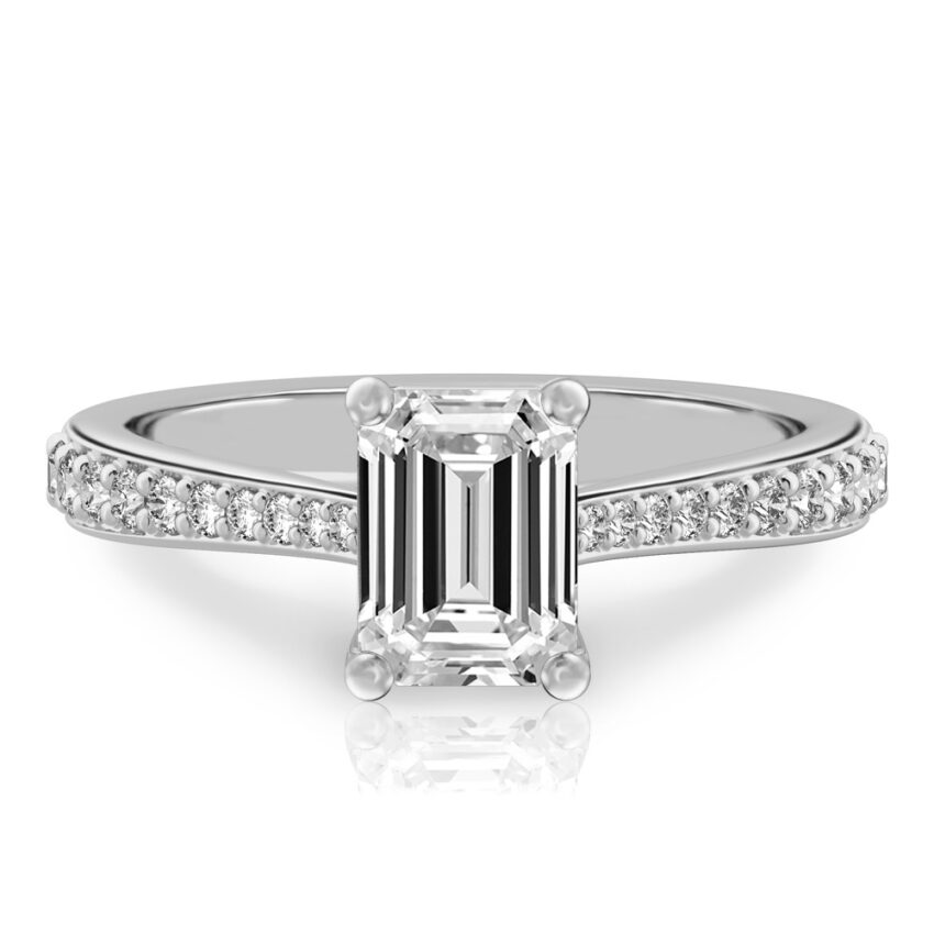 emerald cut diamond tapered engagement ring in platinum