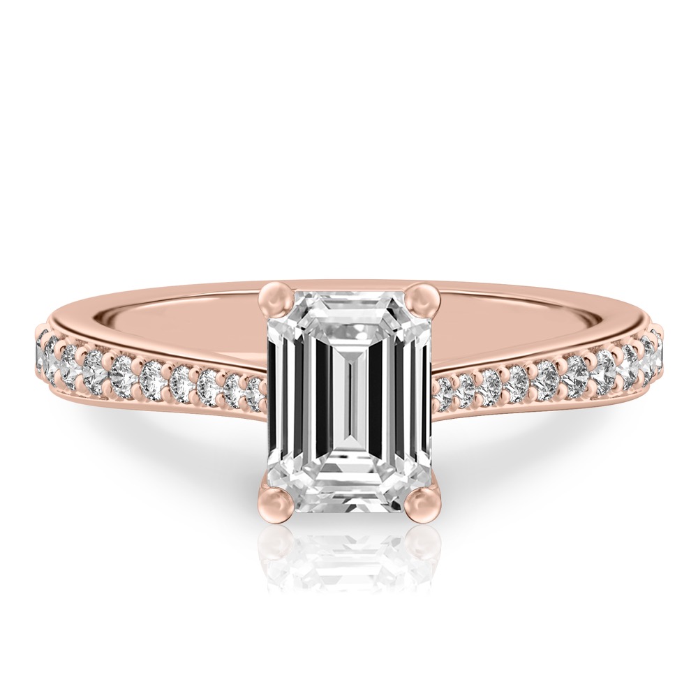 emerald cut diamond tapered engagement ring in rose gold