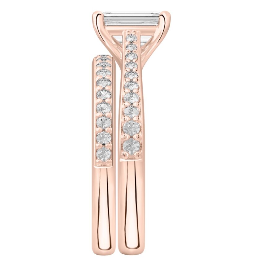 Side view of emerald cut diamond tapered engagement ring set rose gold