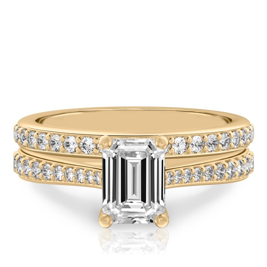 emerald cut diamond tapered engagement ring set yellow gold