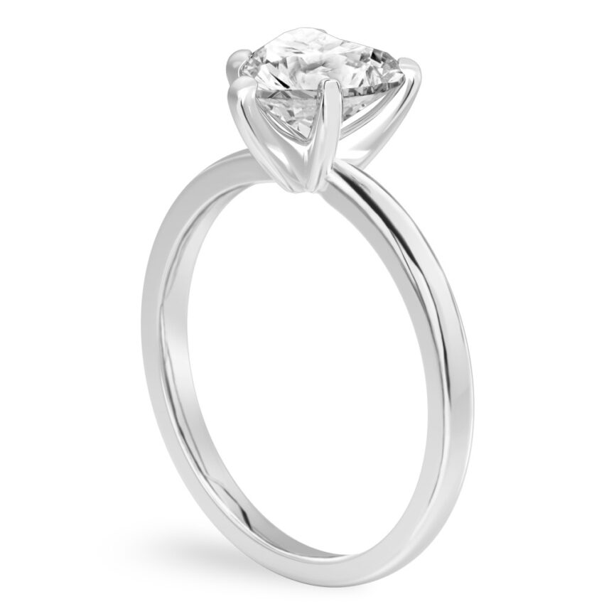 Angle view of heart shape diamond classic solitaire engagement ring in palladium