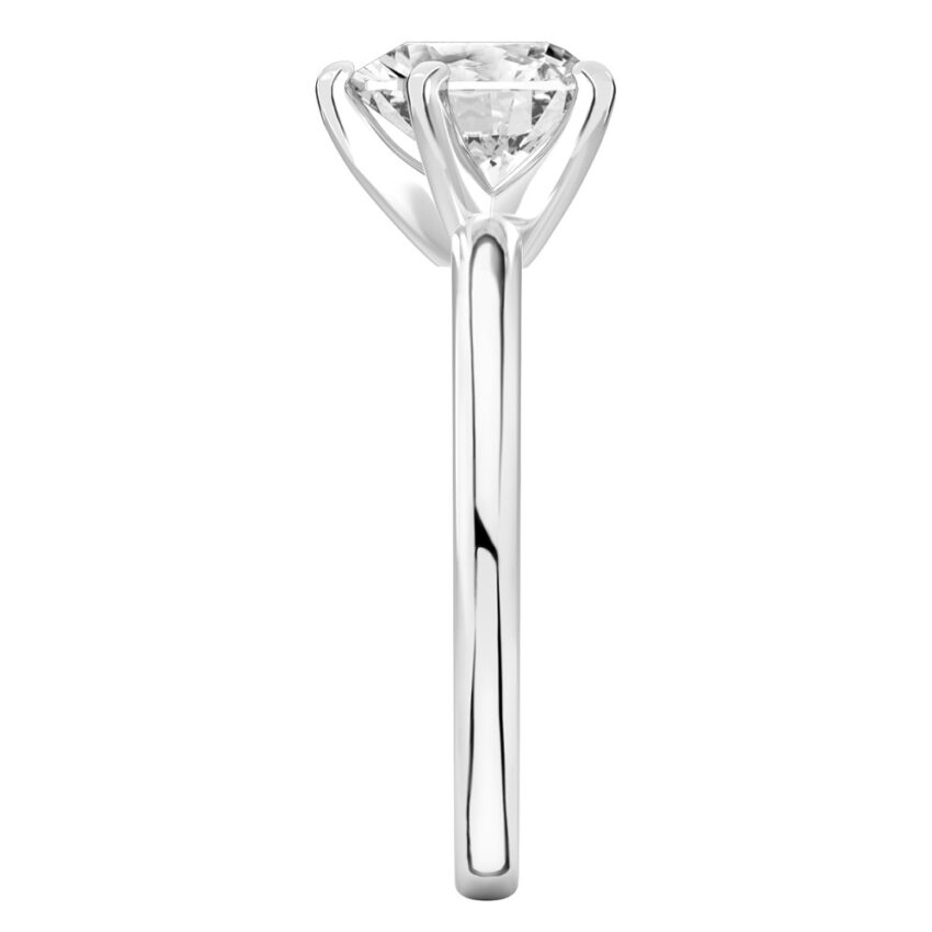 Side view of heart shape diamond classic solitaire engagement ring in palladium