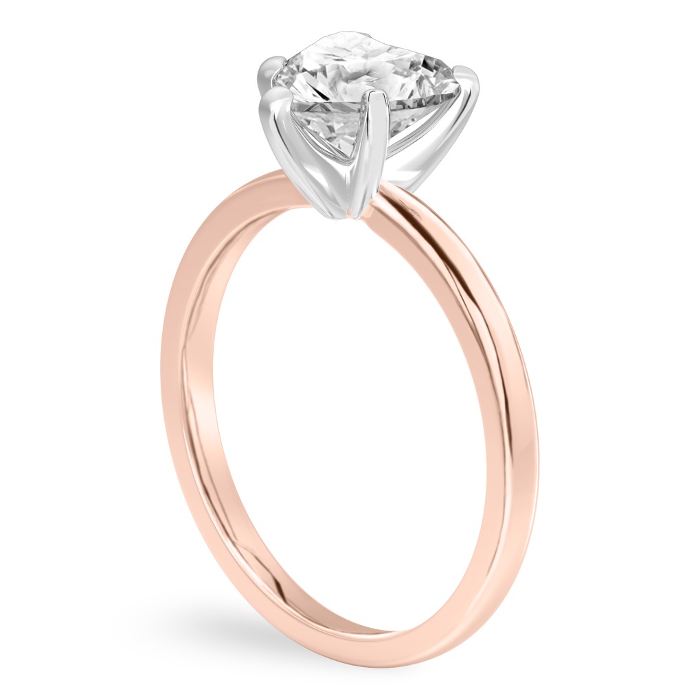 Angle view of heart shape diamond classic solitaire engagement ring in rose gold