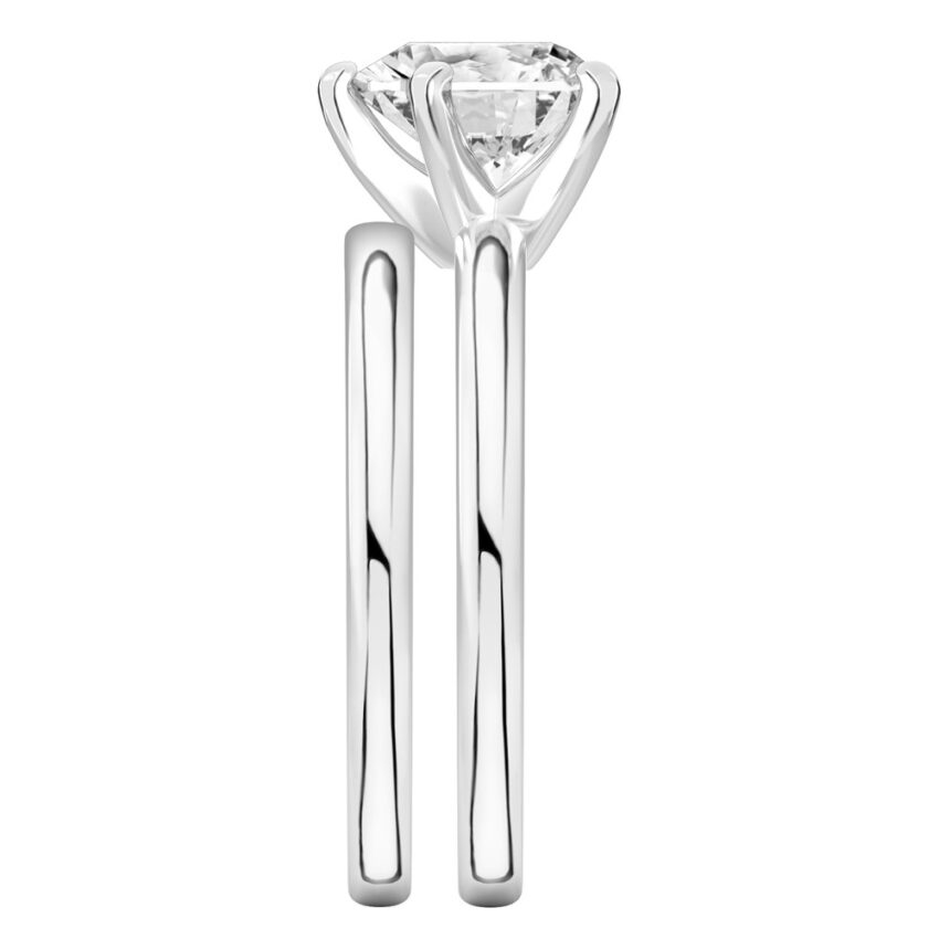 Side view of heart shape diamond classic solitaire engagement ring set palladium