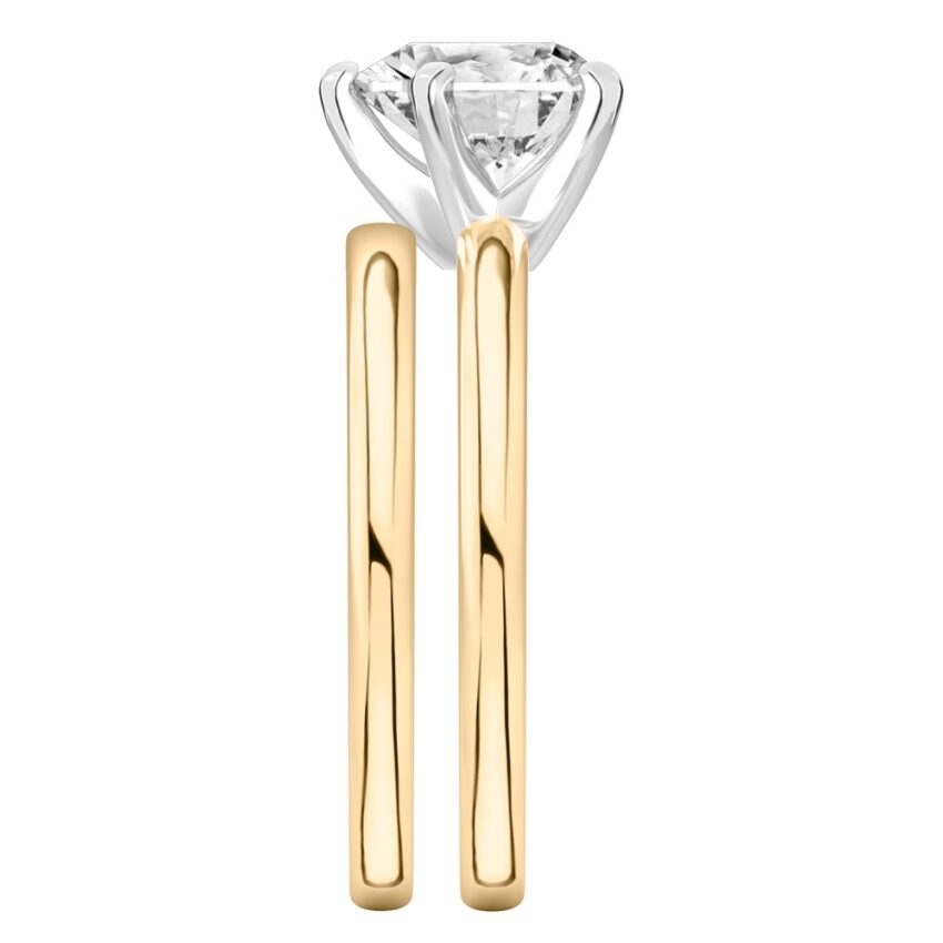 Side view of heart shape diamond classic solitaire engagement ring set yellow gold